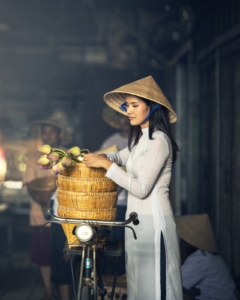 Vietnamese woman and bike Vietnam